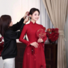 Áo dài lụa điểm bướm hoa ẩn sắc