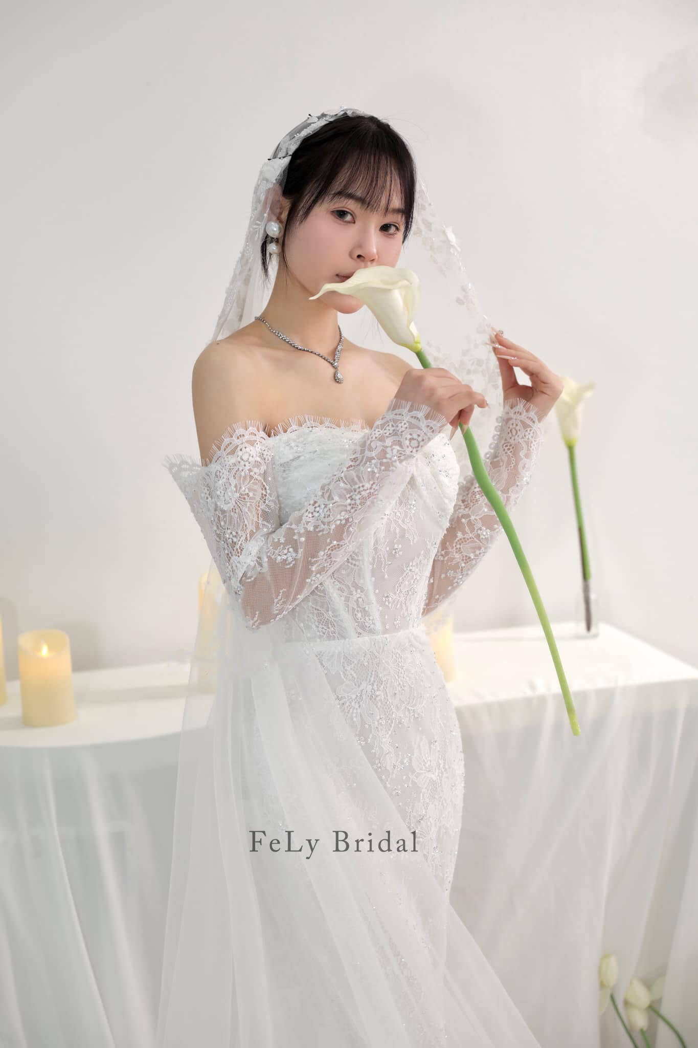 Váy cưới đuôi cá ren tay dài xuyên thấu Váy cưới đuôi cá ren tay dài xuyên thấu