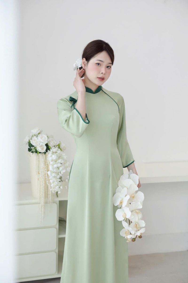 ao dai be trap mau xanh 1