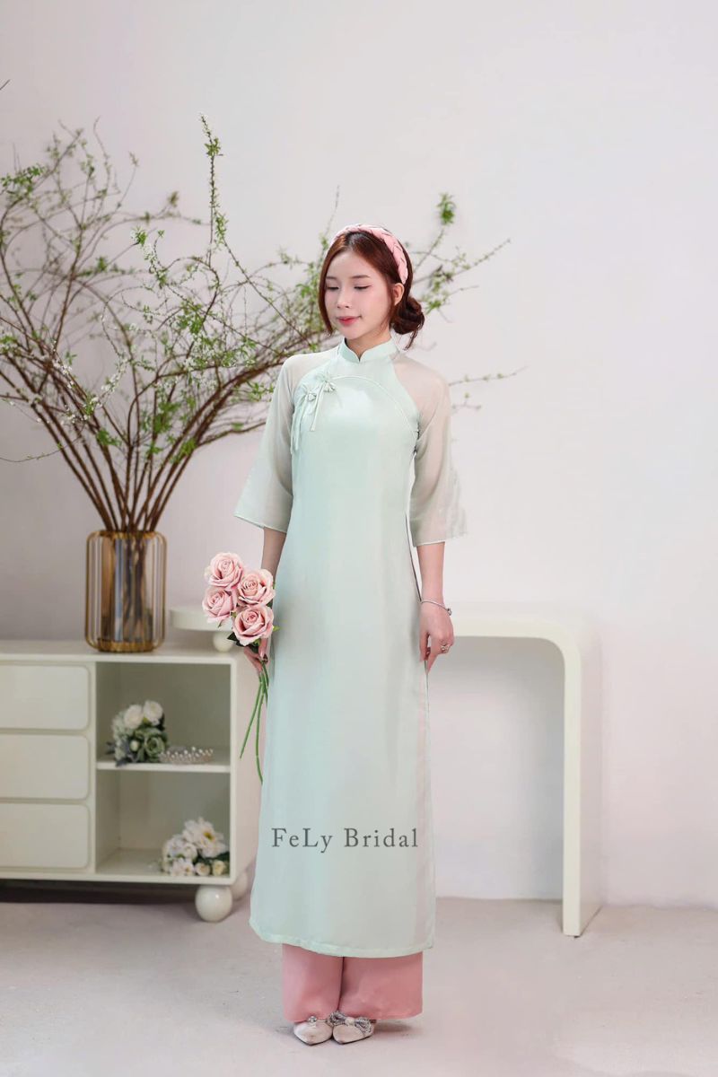 ao dai be trap mau xanh 2