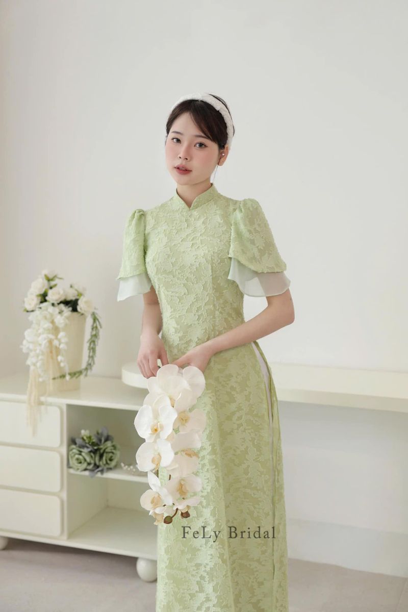 ao dai be trap mau xanh 4