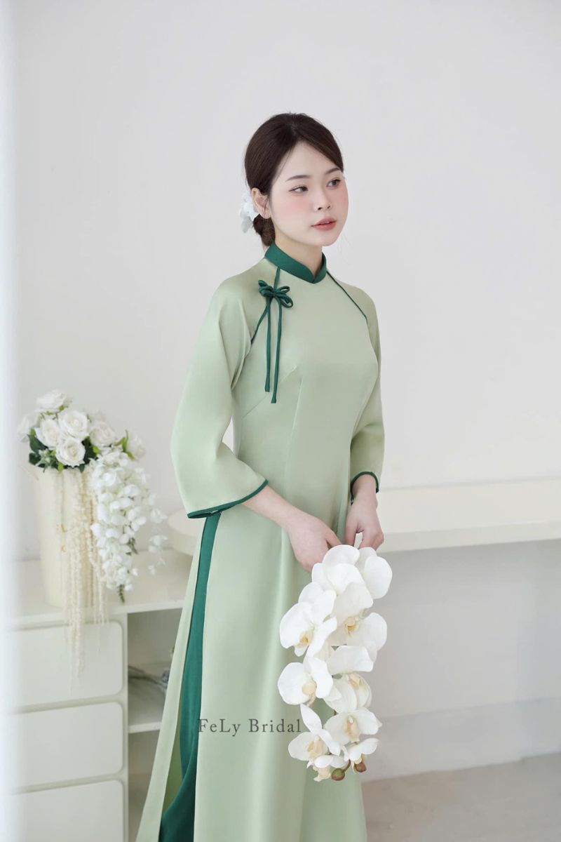 ao dai be trap mau xanh 8