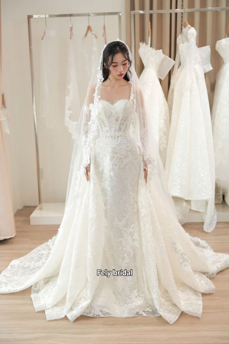Váy cưới đuôi cá ren dài tay cúp ngực