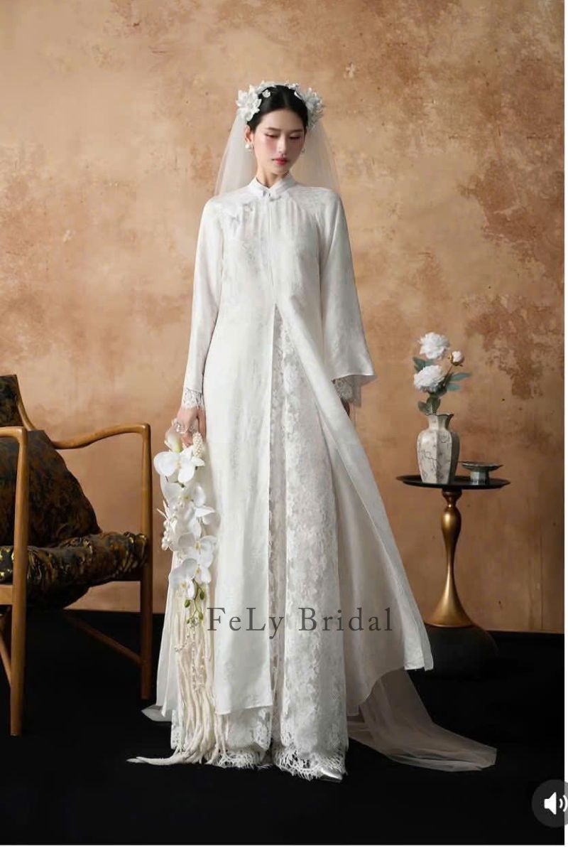 Áo dài cưới cách tân gấm vân hoa chìm phối ren