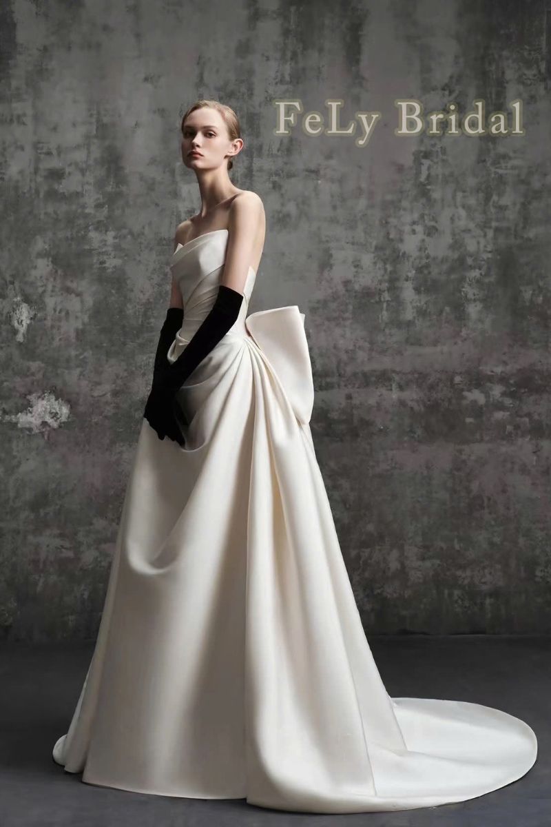 Váy cưới đuôi cá satin xếp ly phối nơ bản to